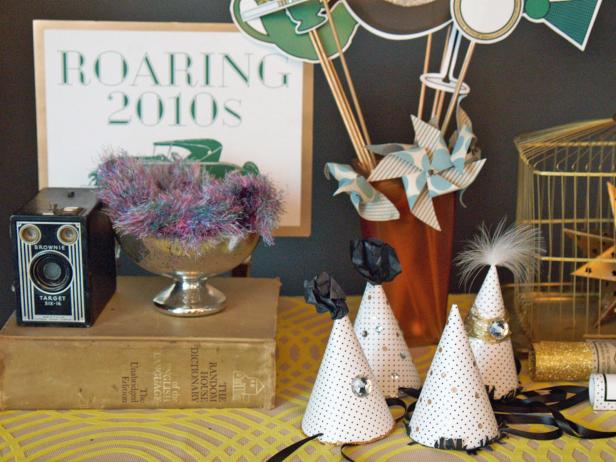 Set up a table displaying props where guests can pick up accessories on their way into the photo booth. A variety of props keeps things fun and guests interested.