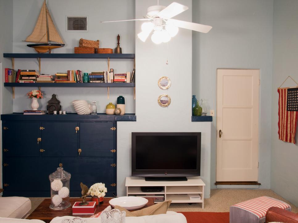 Light Blue Nautical Living Room With Navy Built-In Cabinet & Shelves