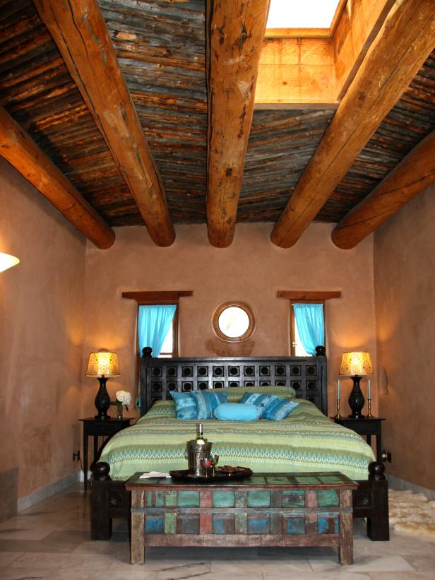 Eclectic Bedroom With Exposed Wooden Beams and Adobe Walls Eclectic Bedroom With Exposed Wooden Beams and Adobe Walls