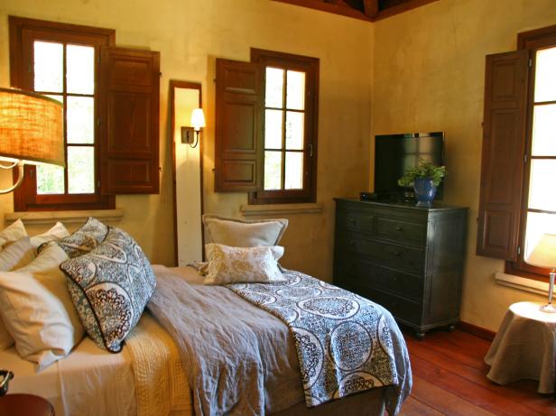 Rustic Western Bedroom With Wooden Shutters Rustic Western Bedroom With Wooden Shutters
