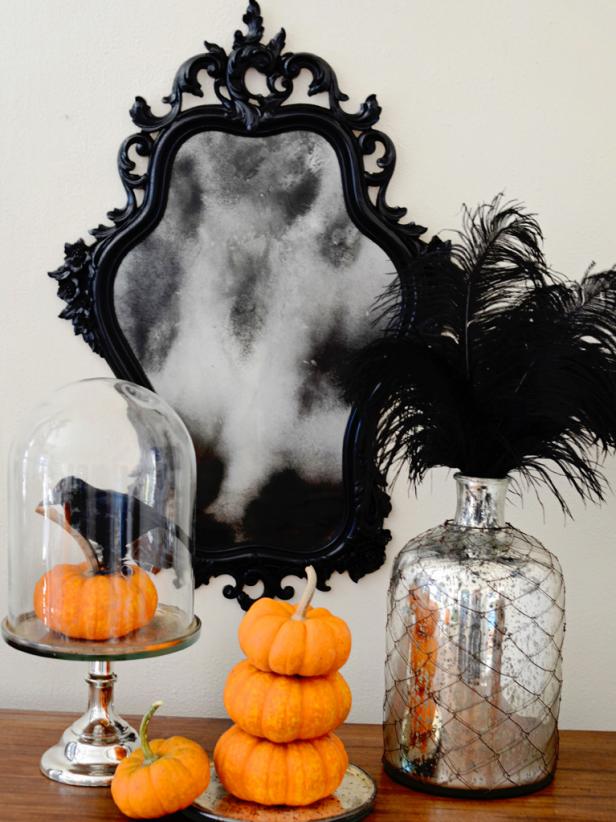 Mirror, Pumpkins and Vase with Black Feathers