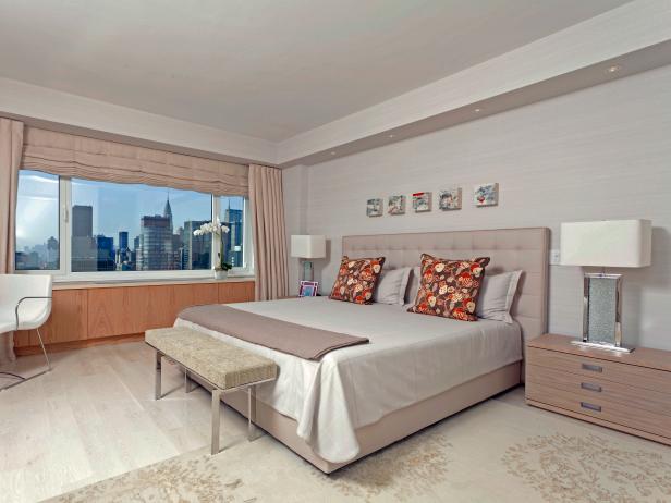 Gray Bedroom with Upholstered Bed and Mixed Textiles