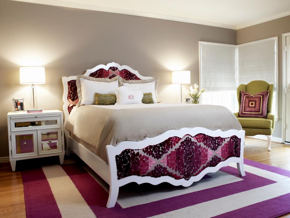 Teen Bedroom With Purple Upholstered Bed and Striped Rug