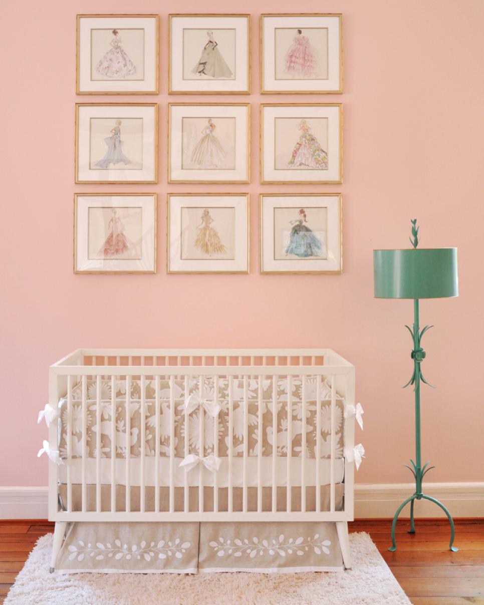 Peach Girl's Nursery With Crib and Framed Barbie-Themed Wall Art