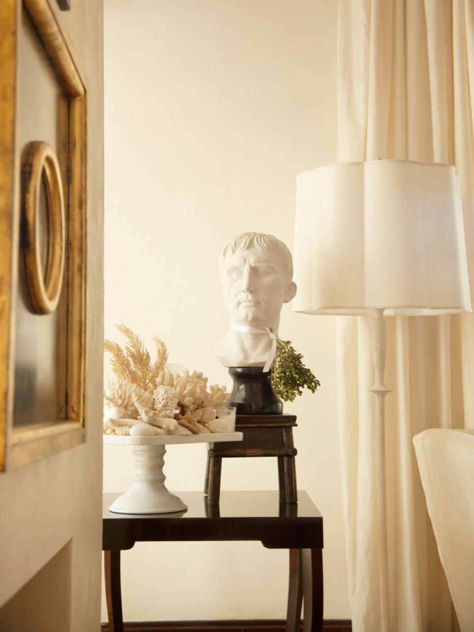 White and Gold Living Room With Classical Bust