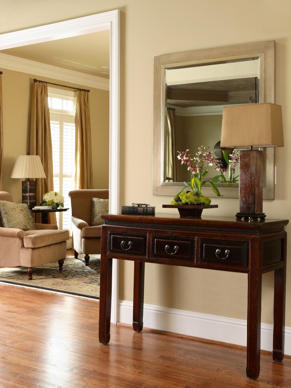 Classic Entryway With Traditional Table and Mirror