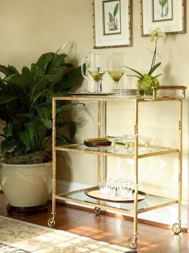 Gold Mobile Bar Cart on Wheels With Glass Shelves and Dish Ware