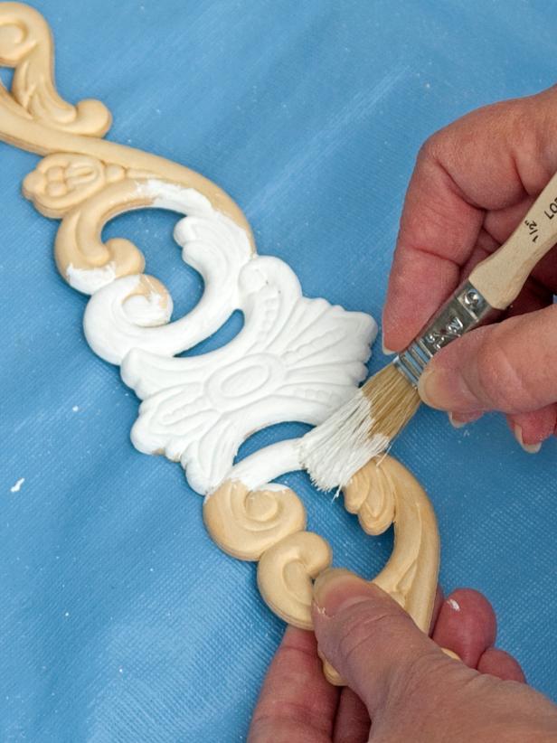 .Paint the spools, finials and trim pieces white with the same paint and the smaller brush (Images 2-4). Let dry. Re-coat as necessary.