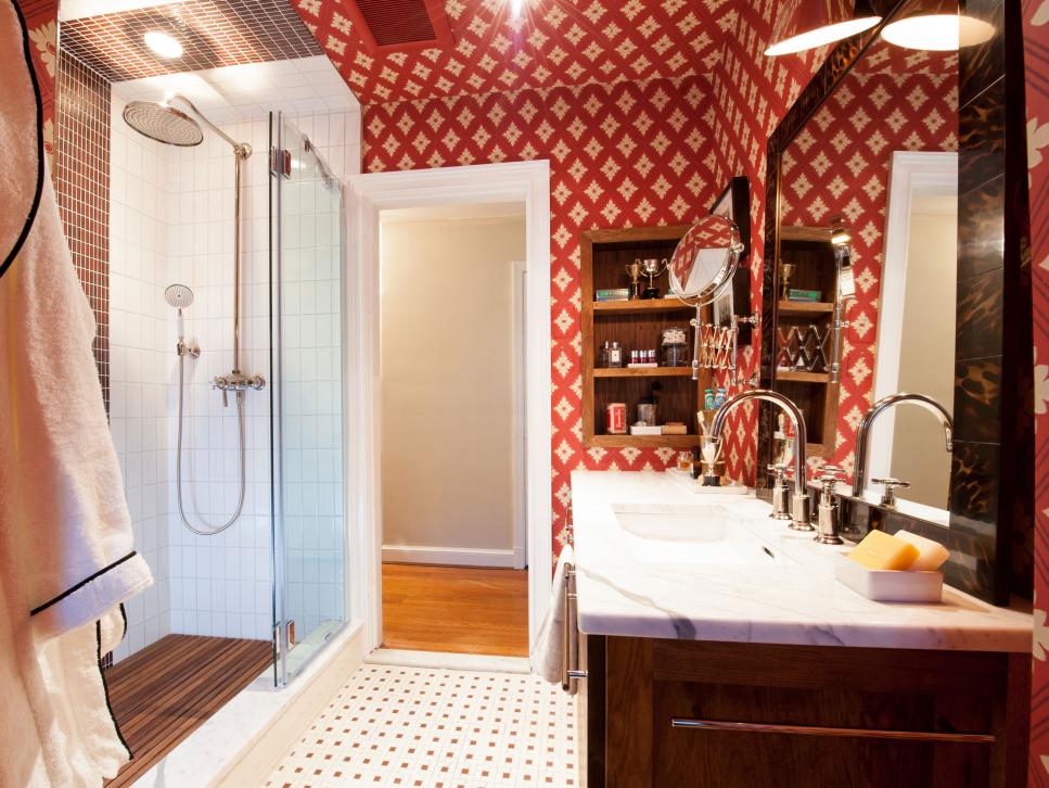Red Bathroom With Marble Countertops and Wood Vanity
