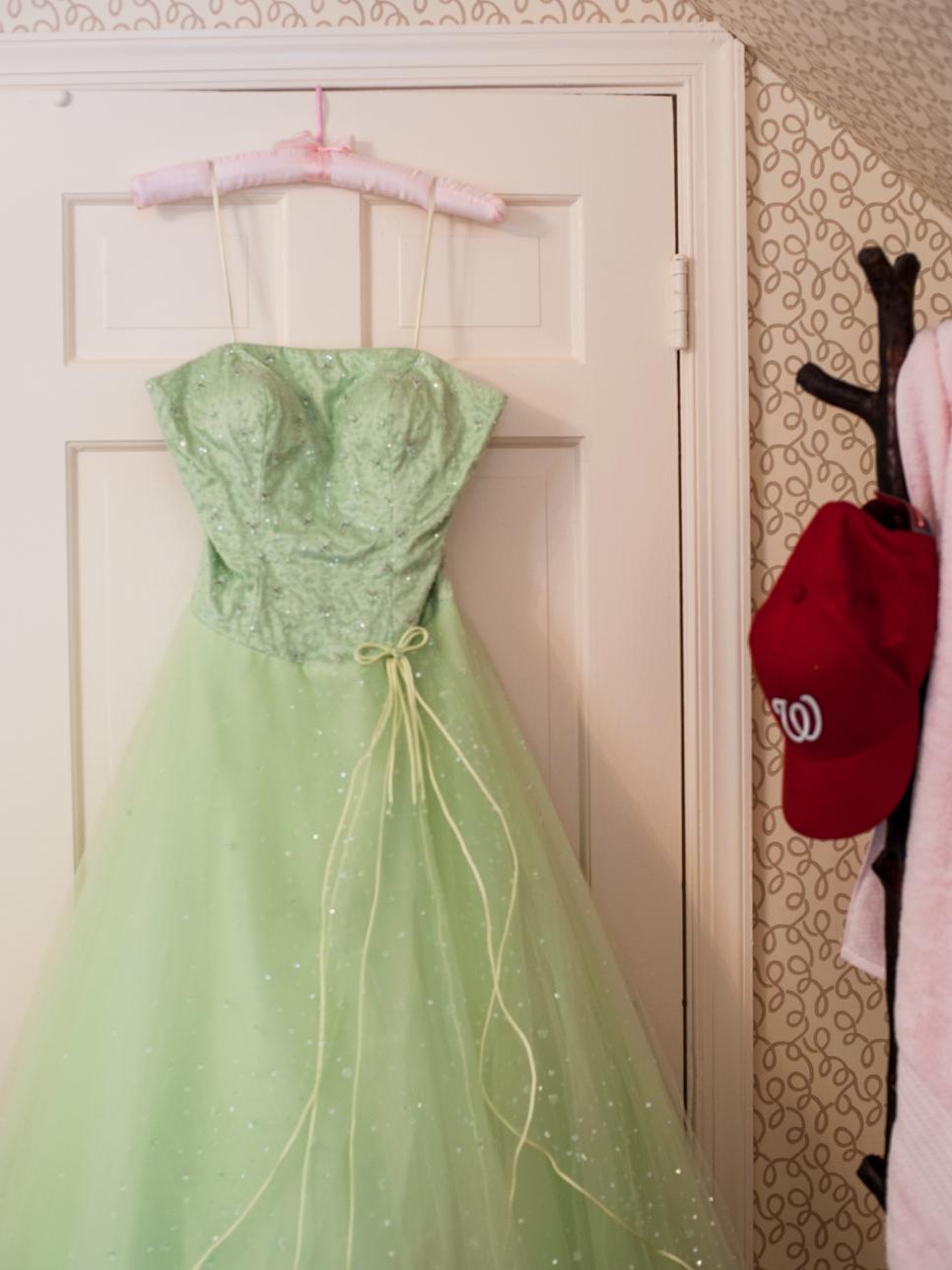 Prom Dress Hangs in Girl's Pink Bedroom