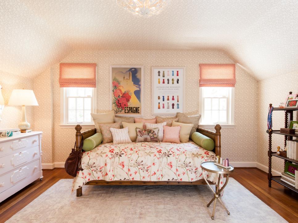 Girl's Bedroom With Patterned Walls and Daybed With Accent Pillows