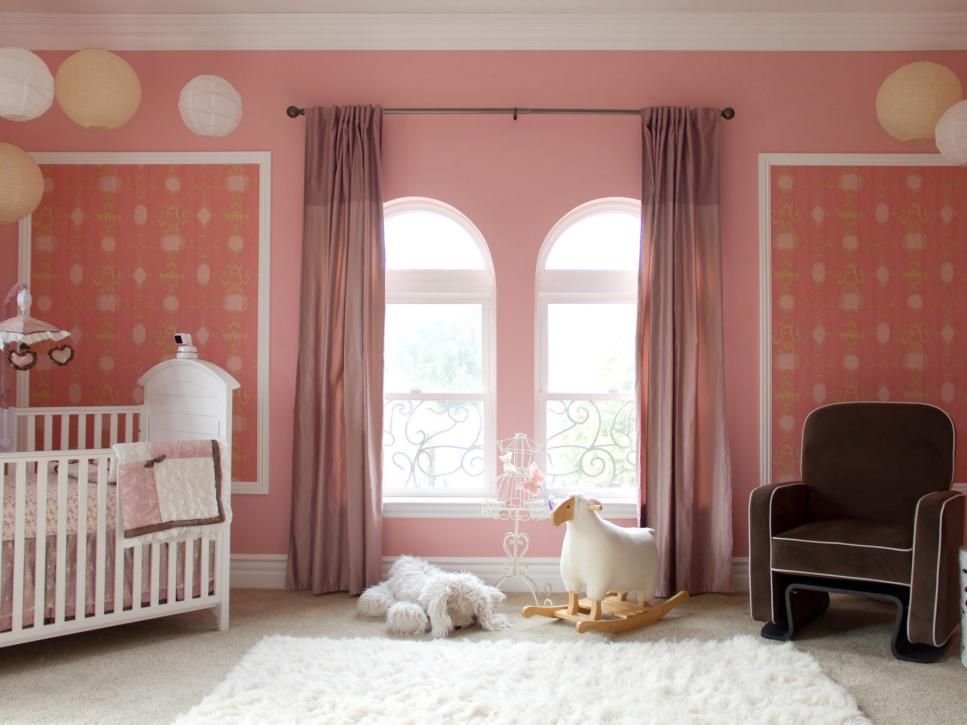 Pink Girl's Nursery With Brown Chair and White Shag Rug 