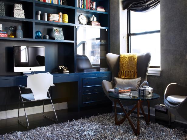 Living Room With Dark Blue Bookcases
