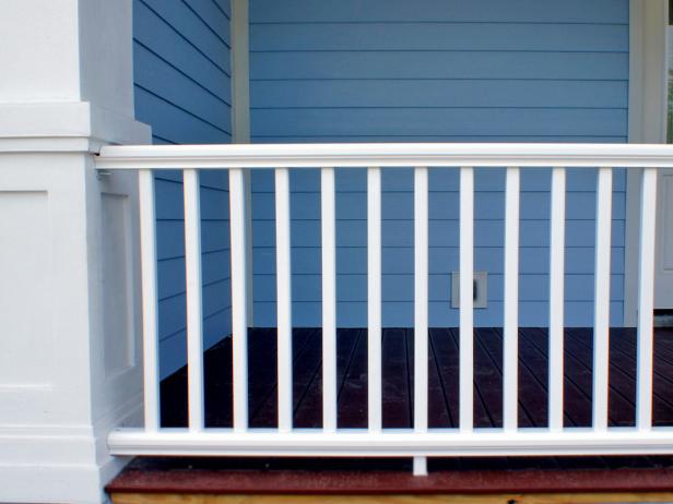 Synthetic porch railings include PVC and composite materials that blend wood particles with resin and vinyl. The surface can be colored and textured to resemble natural wood.