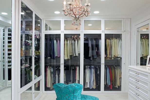 Dreamy Walk-in Closet With Turquoise Chair