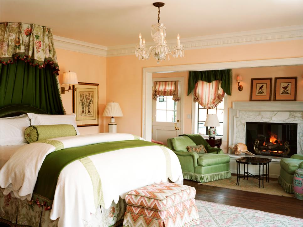 Traditional Bedroom With Marble Fireplace and Green & Pink Accents