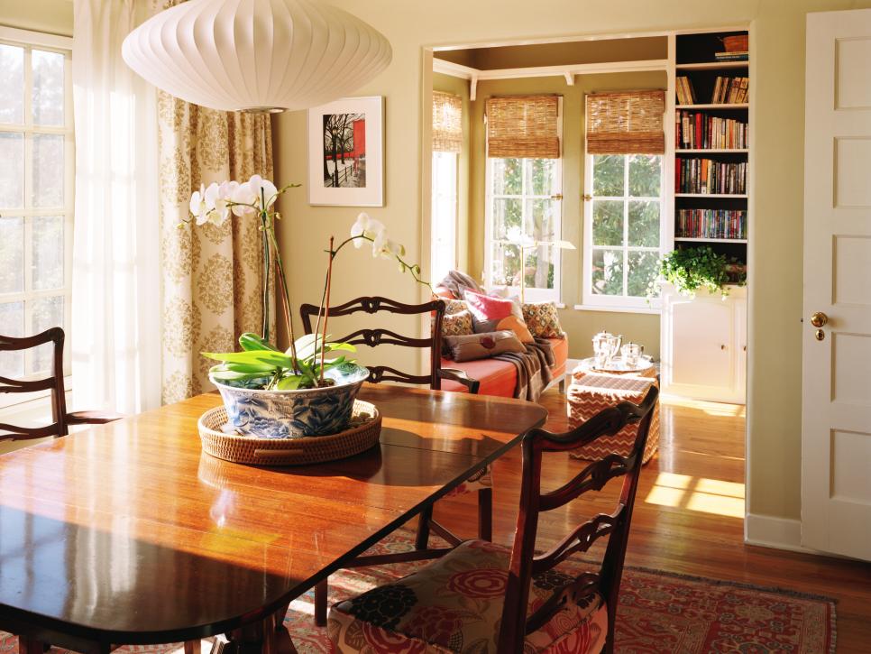 Dining Room With Paper Lantern and Wood Table