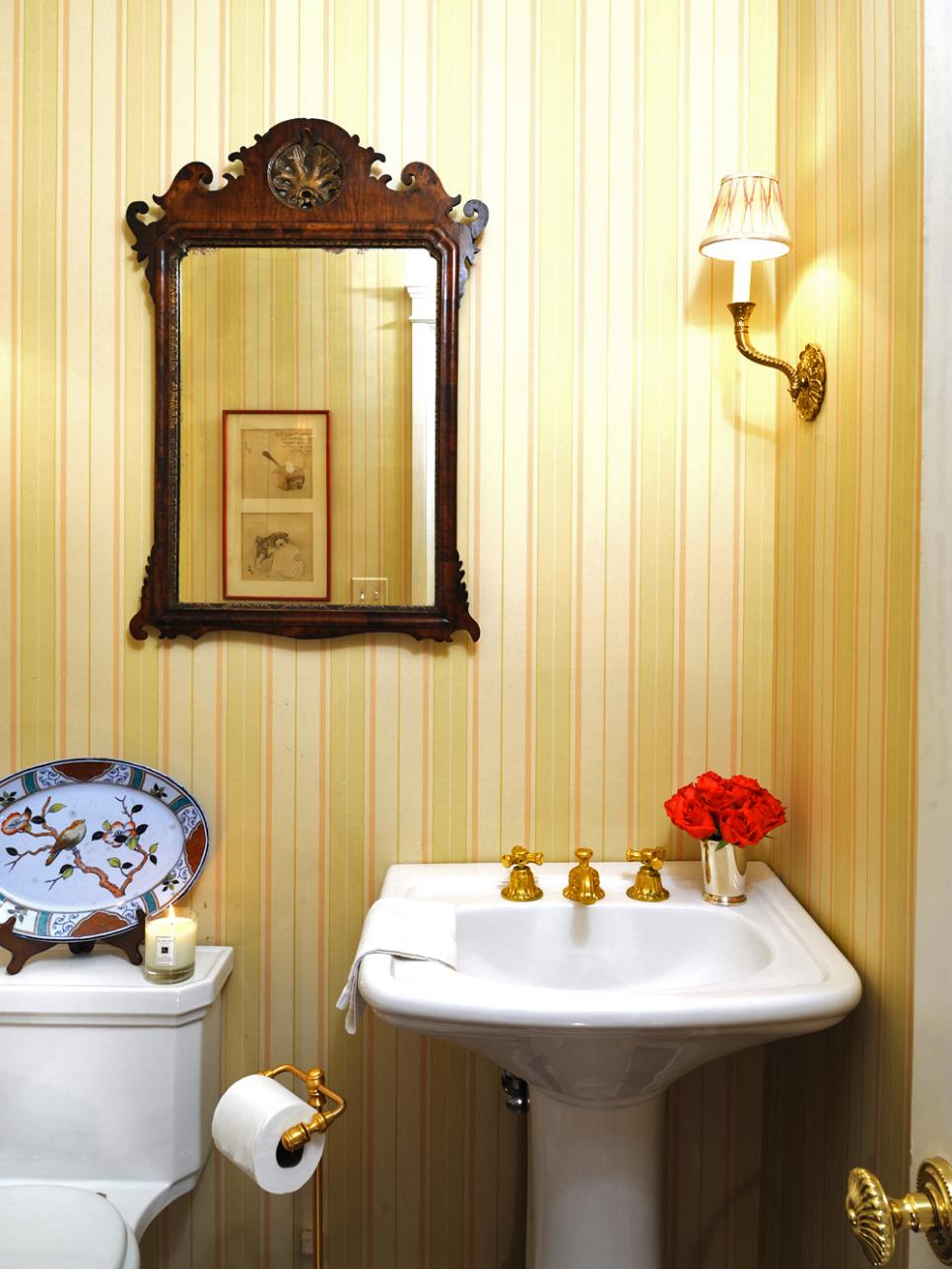Powder Room With Striped Yellow Wallpaper and Pedestal Sink