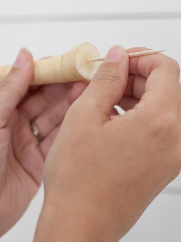 Insert a toothpick into the cut ends.