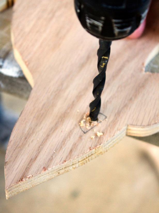 Create a starter hole in the center of the eye using an extra-large drill bit.
