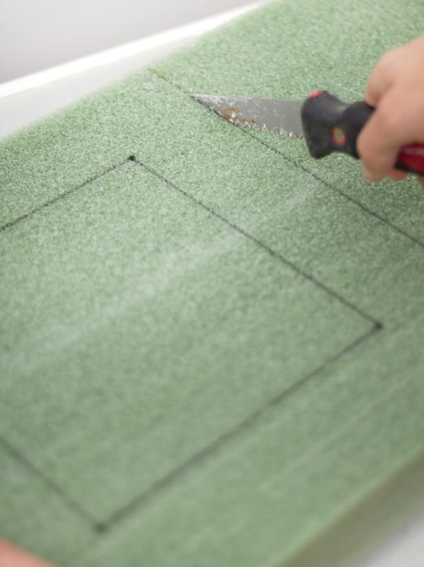 Use a drywall or foam-cutting knife to cut the foam along the lines drawn in the previous step.