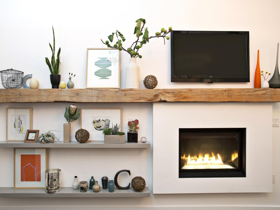 Living Room Fireplace With Wood Mantel and Built-in Shelving