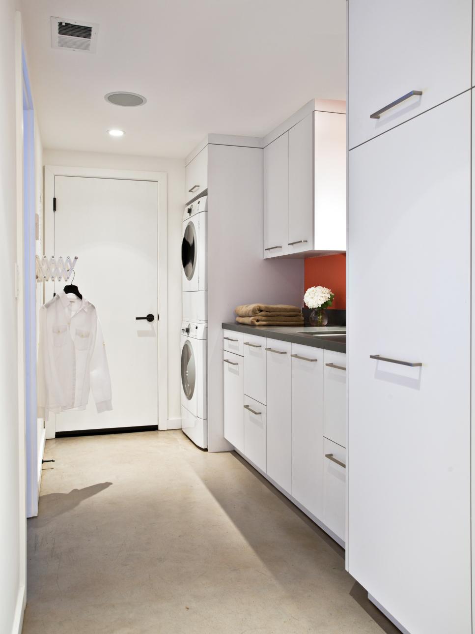 Laundry Room With Stacked Washer and Dryer 