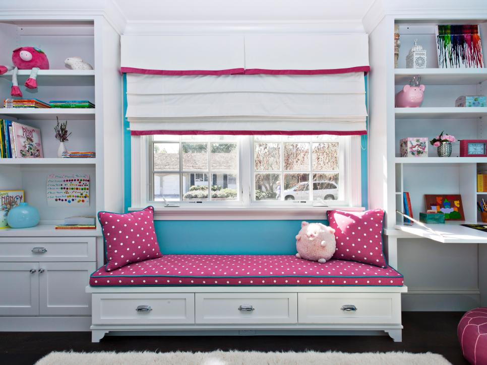Girl's Blue Bedroom with Pink Window Seat