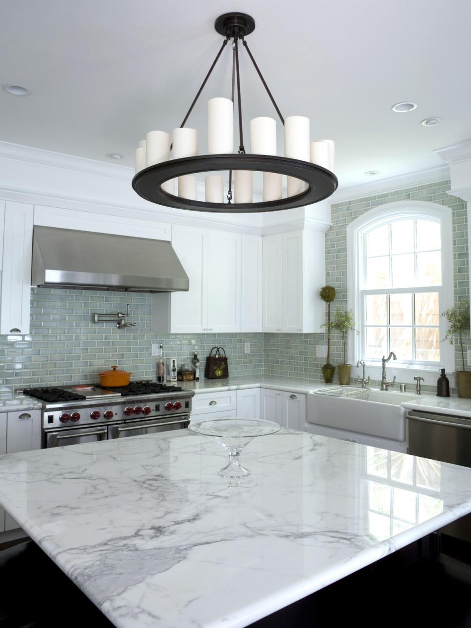 Transitional Kitchen With Square Marble-Topped Island