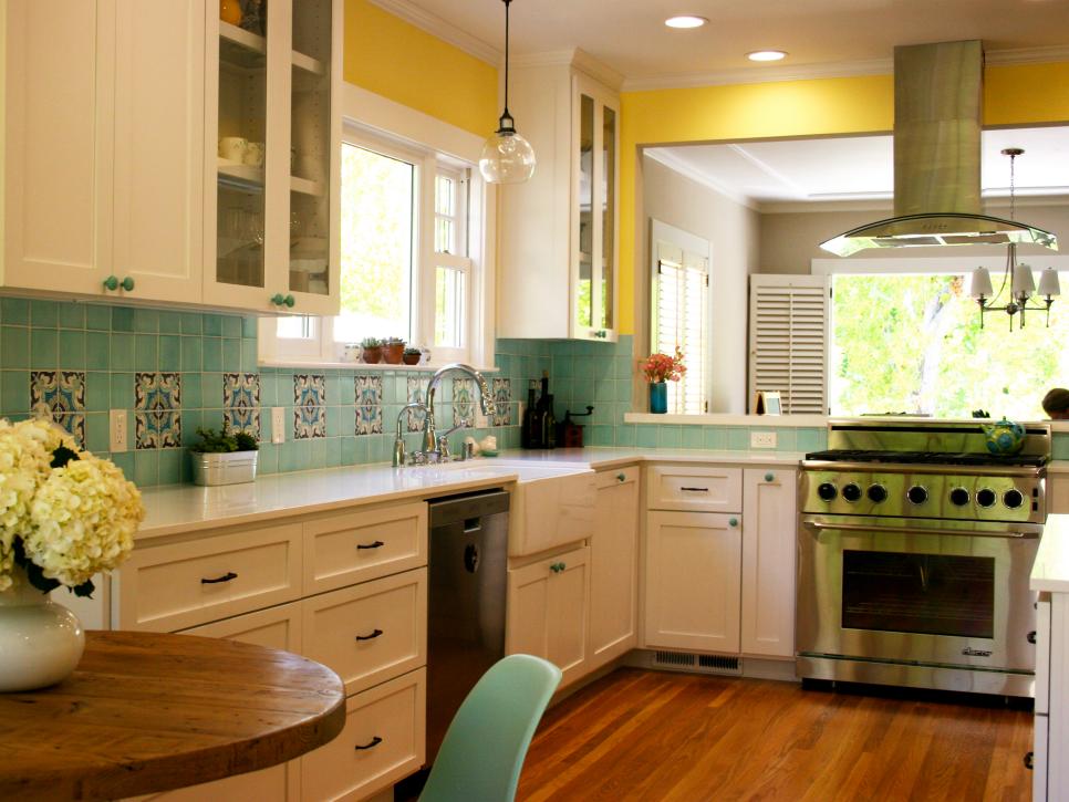 Yellow and Turquoise Kitchen With White Shaker-Style Cabinets