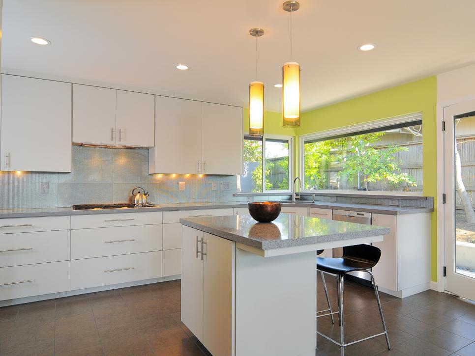Modern Lime Green and White Kitchen With Island and Pendant Lights