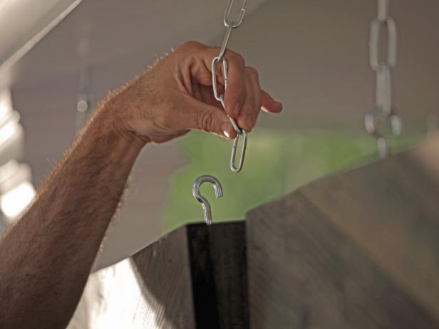 Next, screw C-hooks into holes in top of frame, add corresponding C-hooks to the ceiling and attach to one another with pre-cut chain.
