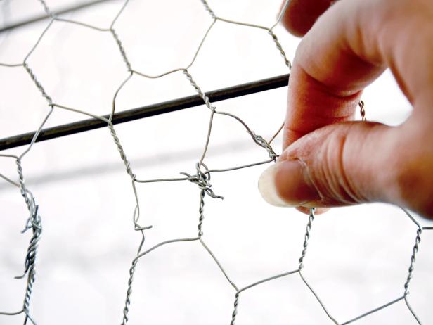 Using your fingers or needle-nose pliers, gently twist wire together to connect the ends