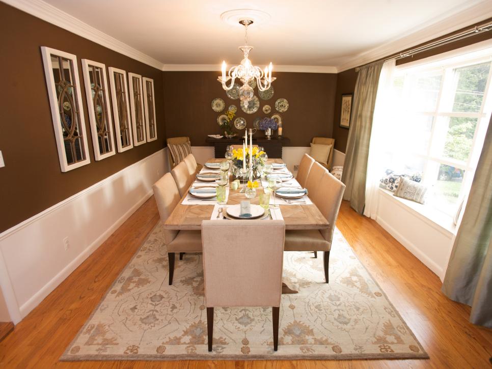 Dark brown wall color in traditional dining room