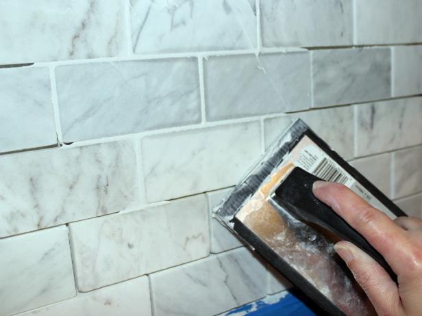 Apply Grout to Marble Tile Kitchen Backsplash