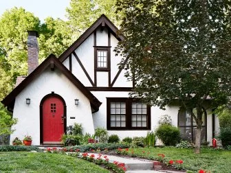 Red Door and Flowers Along Sidewalk