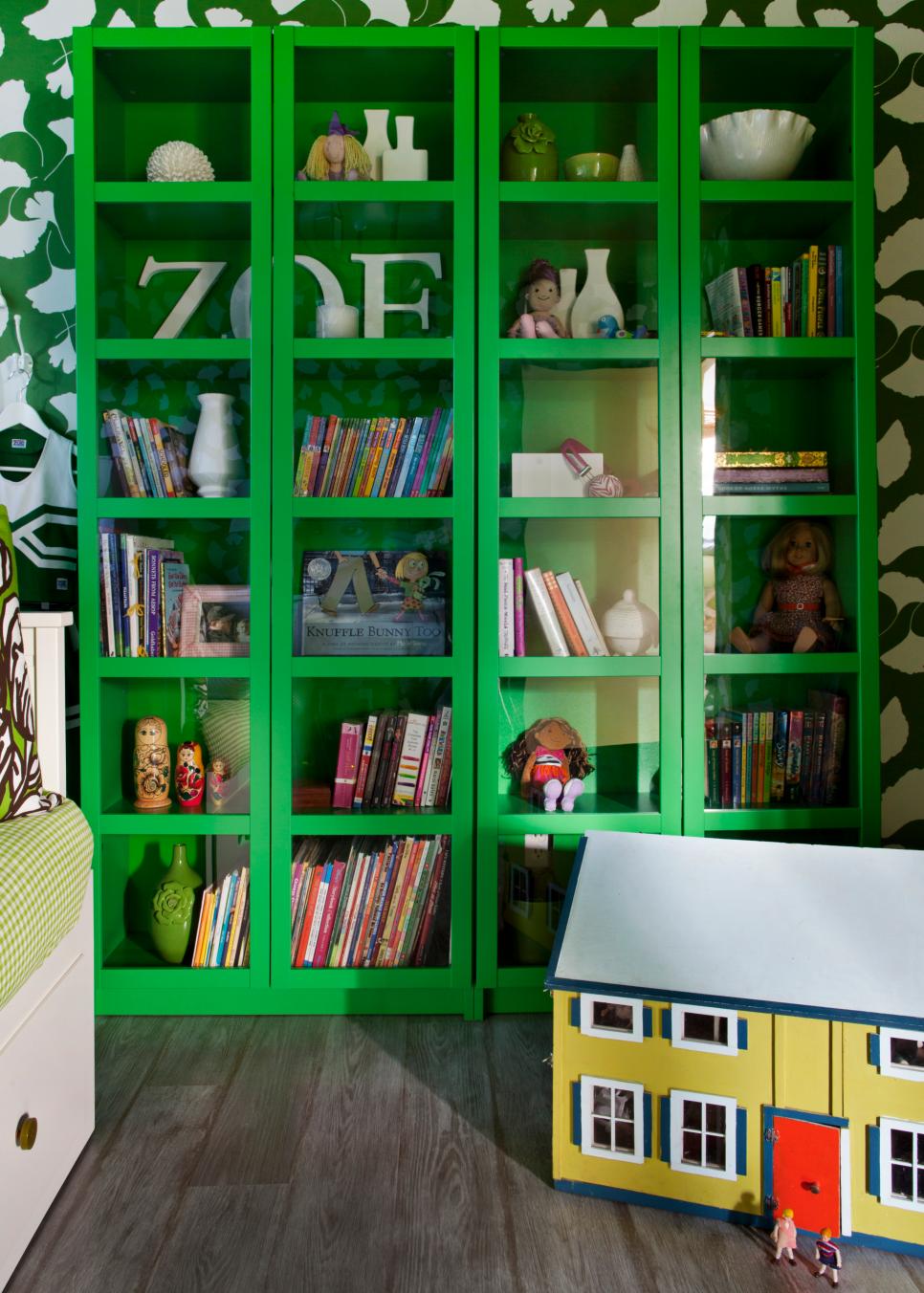 Girl's Bedroom With Green Glass Bookcases