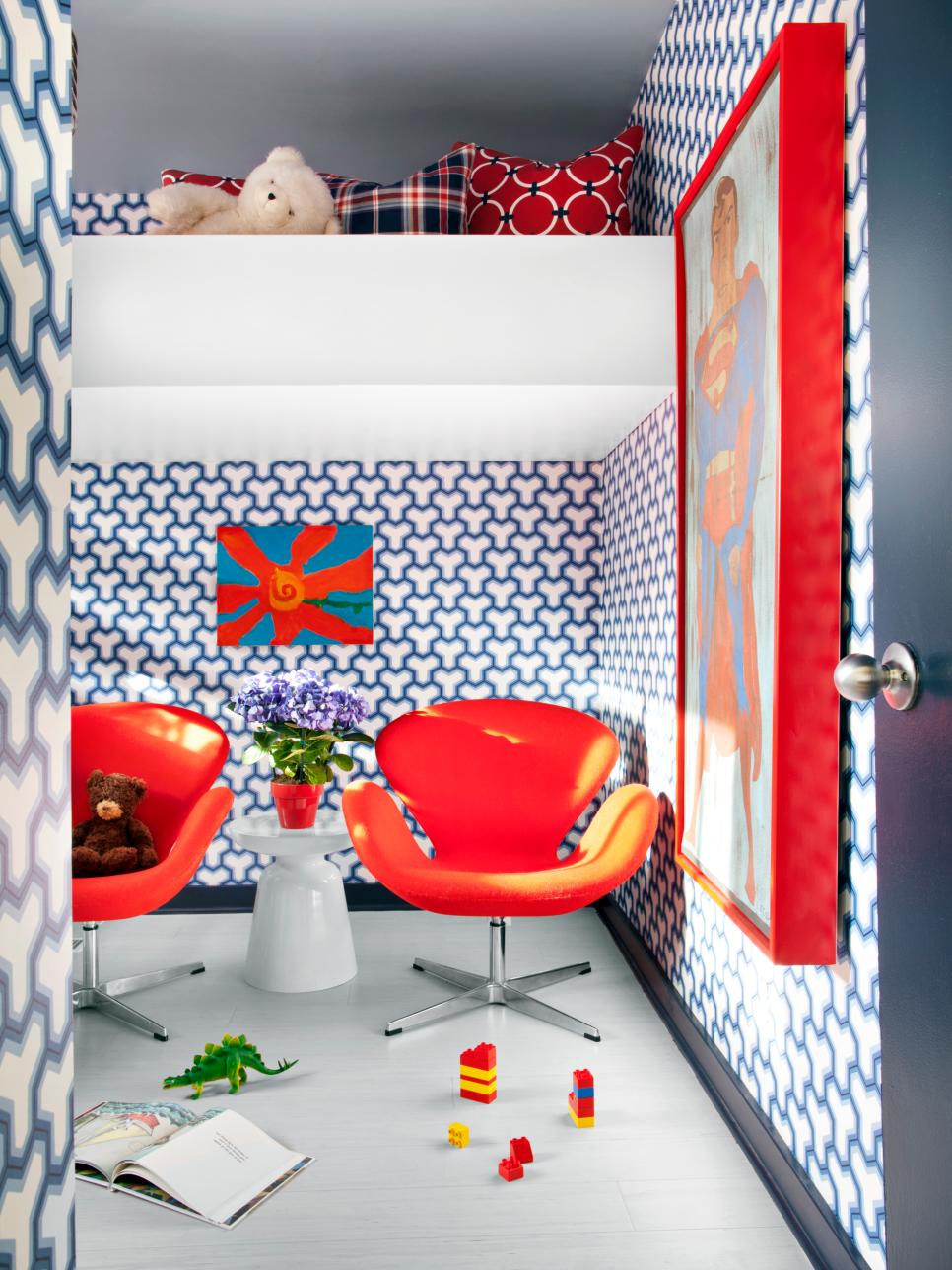 Boy's Bedroom With Geometric Blue-and-White Wallpaper and Red Chairs