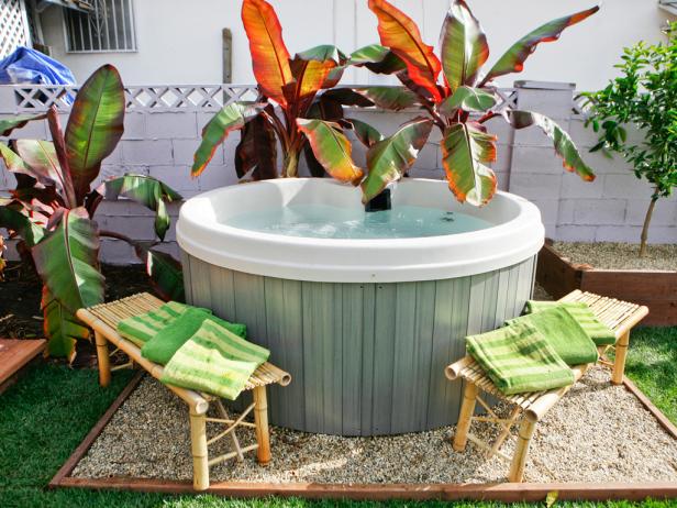 Small Backyard Hot Tub With Tropical Plants | HGTV