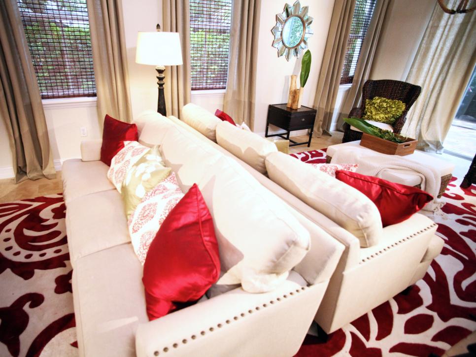 Neutral Living Room With White Sofas, Red & White Rug & Beige Curtains