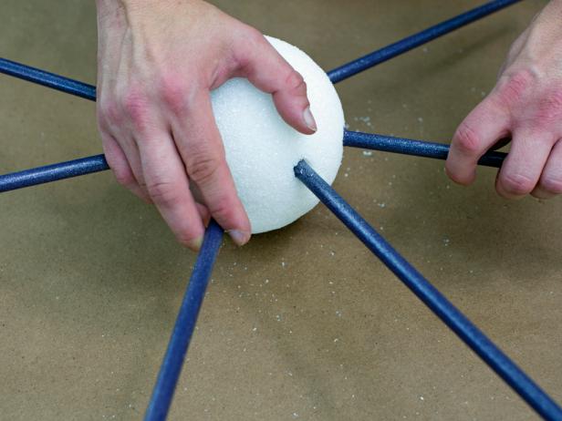 Using placement of the first 3/8" dowel as a guide, insert dowels into foam sphere at 1:30, 3:00, 4:30, 7:30, 9:00 and 10:30. Note: The bottom 6:00 position is left open for placement atop the tree