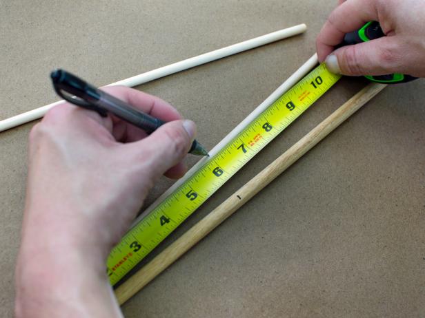 Next, measure and mark each 1/4" wooden dowel at six inches in length.