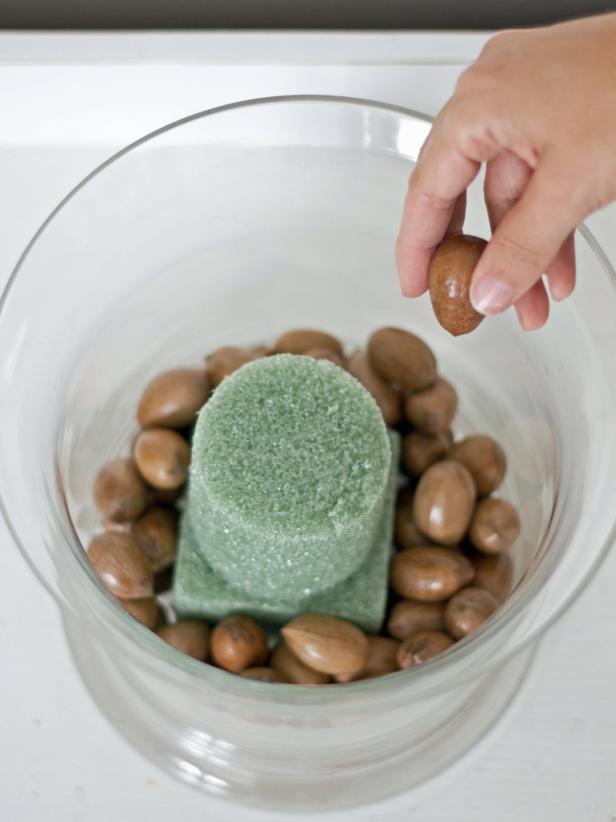 Surround the foam with a layer of one type of nut; for instance, we used pecans.