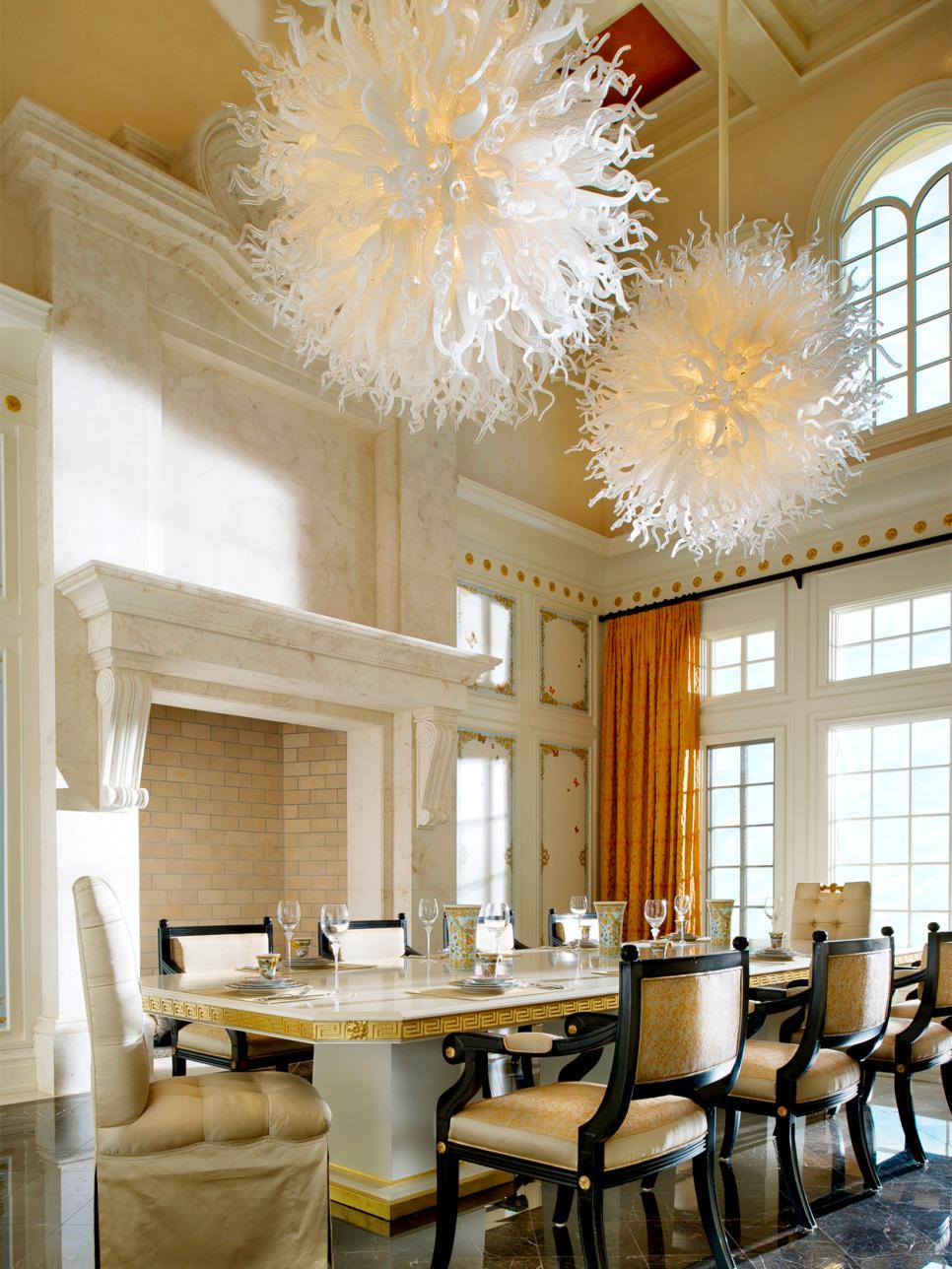 Traditional Dining Table With Upholstered Chairs and Chandelier Art