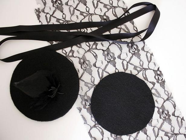 Attach a strip of lace along the underside of the circle, which looks like a veil.