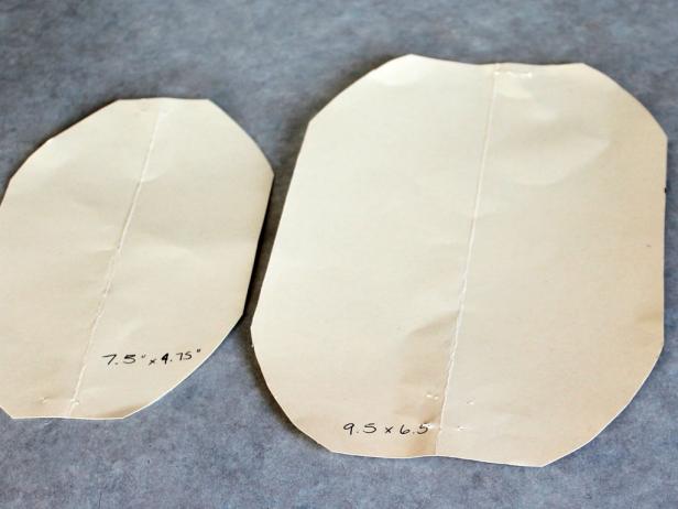 Then fold your rectangle in half to cut the corners, making them rounded. (It doesn't have to be exact.)