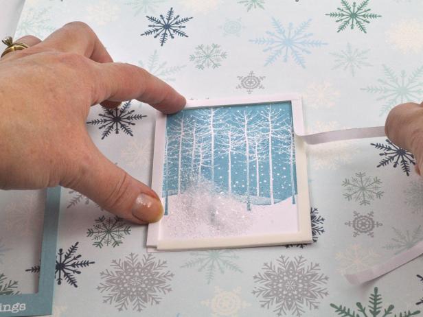 Remove liner of foam tape to expose the adhesive side.