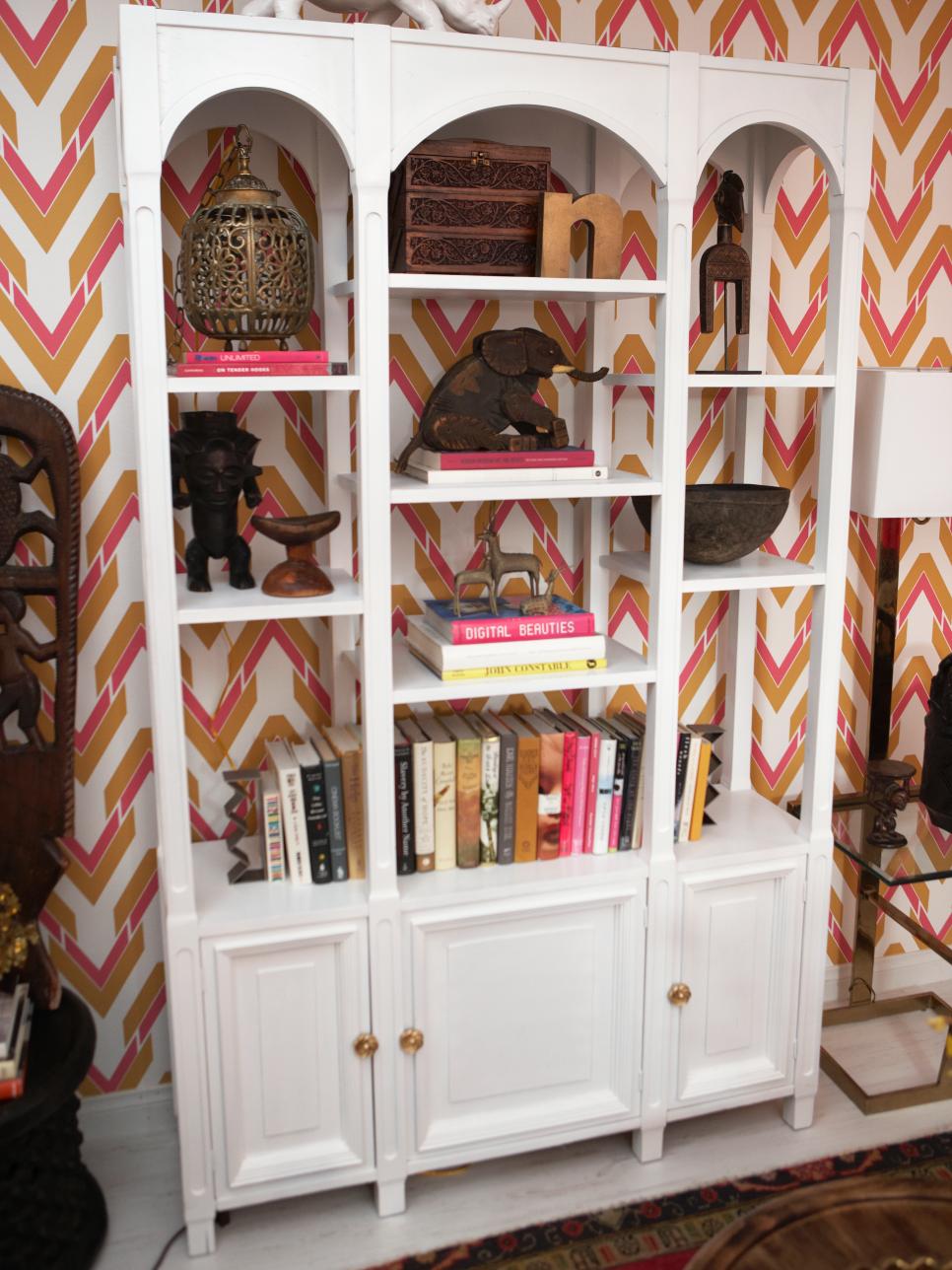 Eclectic Living Room with White Bookshelf Chevron Walls