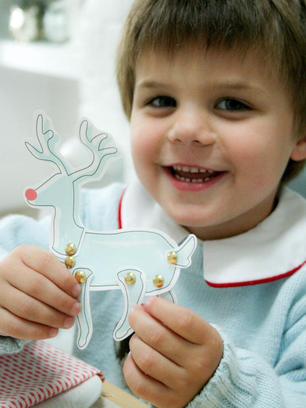 Craft time is playtime with moveable, posable card-stock reindeer. Use brads to attach the reindeer's head, legs and tail to its body. For the smallest crafters, precut the brad holes to make assembly a breeze.