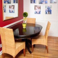 Cute Breakfast Room With Family Portrait Gallery Wall